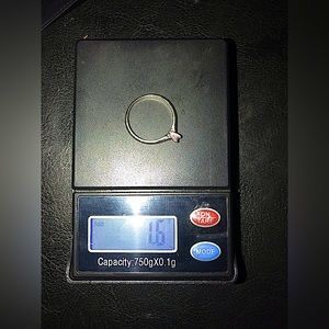 White gold ring 1.6 grams and 1/4 carat princess cut diamond. Tested/appraised!!